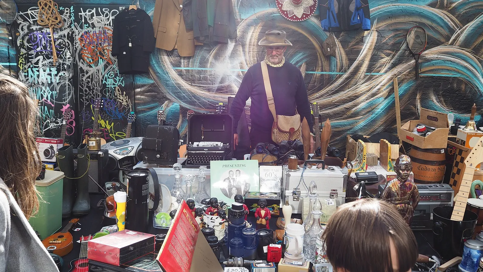 Stalls and crowds at Brick Lane market in east London