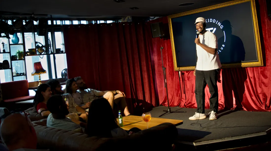 Audience watching live stand-up in the flagship room at JK Comedy Club Leicester Square