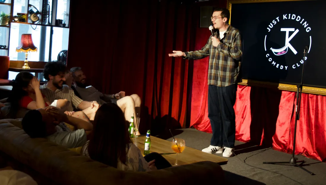 Saturday night audience watching live comedy at JK Comedy Club Leicester Square