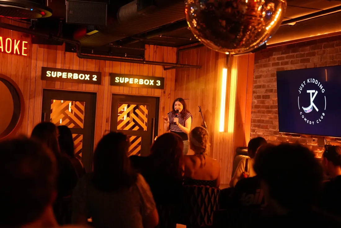 The basement comedy room at JK Comedy Club Piccadilly Circus, with the stage and audience seating